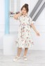 Mädchenkleid mit Blumenmuster und Gürtel